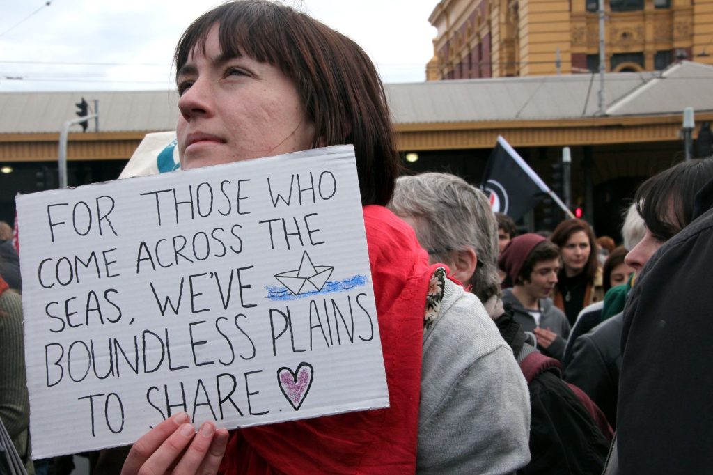 A sign welcoming asylum seekers to Australia